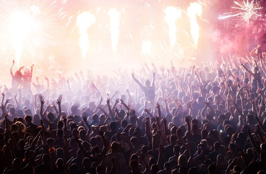 Image of crowd at a festival for seven essential steps in creating a festival line up