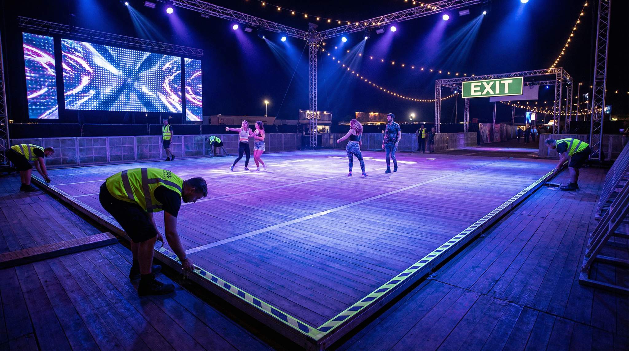 Dance Floors as Festival Infrastructure: Sprung Decks, Surfaces, and Safety