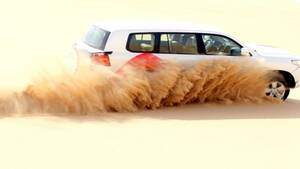 Morning Desert Safari Abu Dhabi: Dune Bashing, Sand Boarding and a Camel Ride