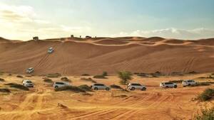 Desert Safari in Ras Al Khaimah with Dune Bashing, Sand Boarding, Camel Ride with transfers from RAK
