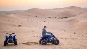 Quad Bike with Private Transfers from Abu Dhabi flyer
