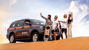 Classic Desert Discovery: Red Dunes Safari, Sandboard & Camel Ride (Morning) - Shared Tour flyer